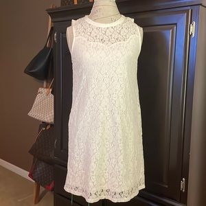 Sleeveless white lace dress